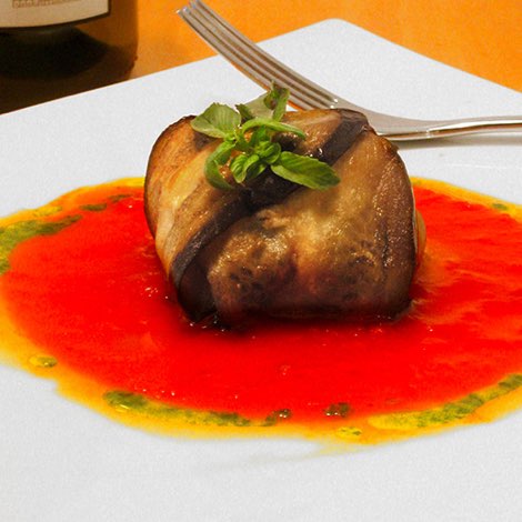 Parmigiana di melanzane con pesce spada