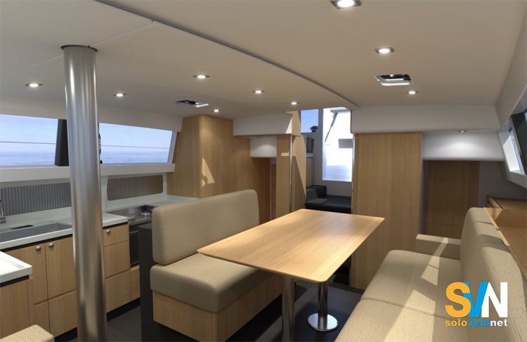 La dinette dell’OVNI 490, realizzata in rovere massello locale, offre spazi generosi e comfort pensati per la lunga navigazione.